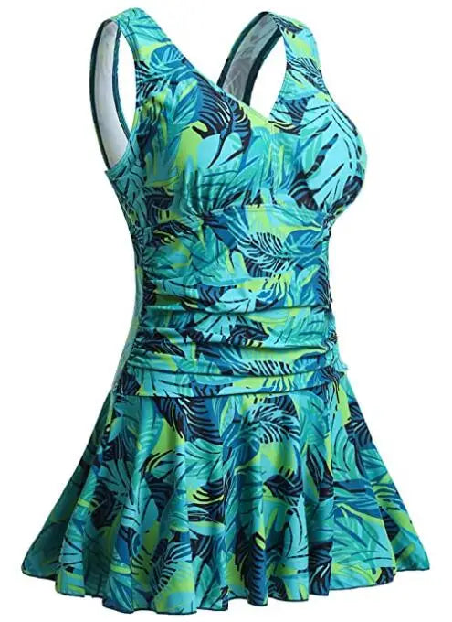 Women’s floral print modest swim dress by The Clothing Company Sydney, plus-size one-piece swimsuit with padding and full coverage.