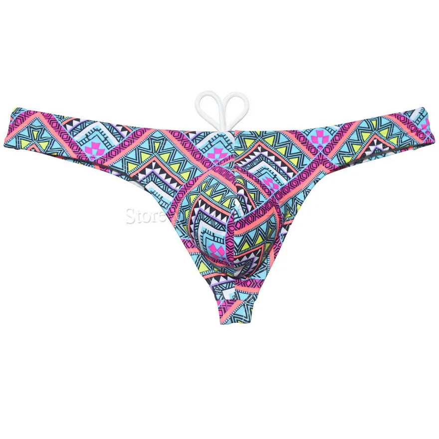 Men's bikini swim thong by The Clothing Company Sydney featuring printed T-back design and smooth fabric for beach and surfwear.