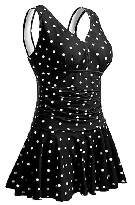 Women’s floral print plus-size modest swim dress by The Clothing Company Sydney, padded one-piece swimsuit with full coverage.