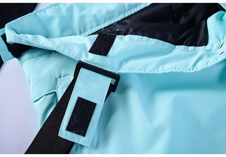 Women's waterproof ski suit with jacket and snow overalls, windproof snowboarding clothing set by The Clothing Company Sydney.