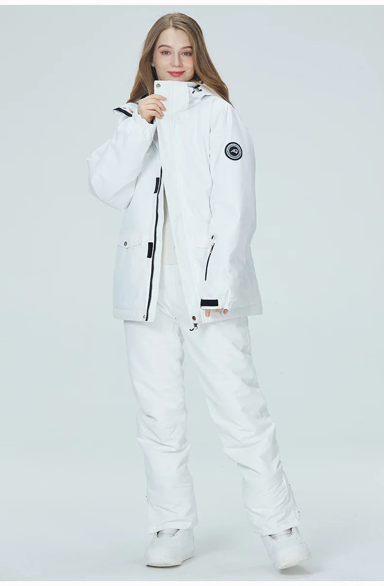 Women's waterproof ski suit and snowboard clothing set with windproof jacket and pants by The Clothing Company Sydney.