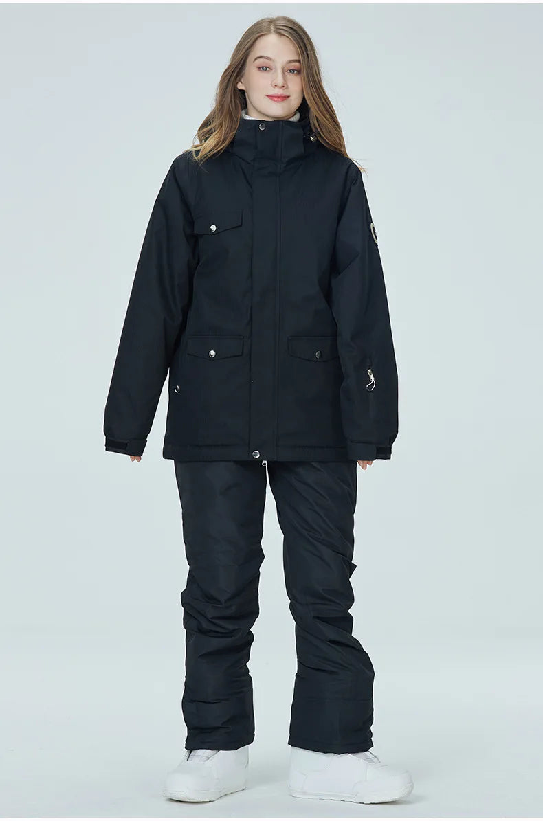Women's waterproof ski suit by The Clothing Company Sydney, includes jacket and snow overalls for snowboarding and winter skiing.