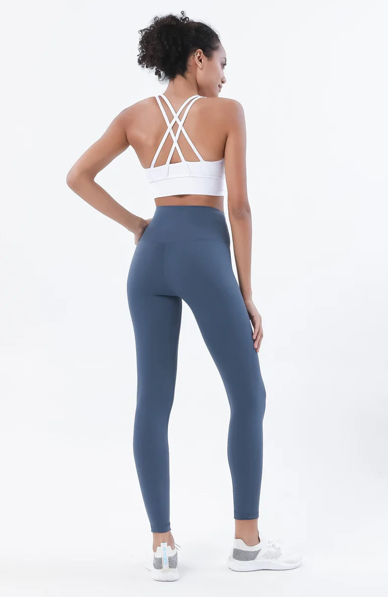 Nylon women's yoga fitness set with breathable sports bra and leggings, gym tracksuit from The Clothing Company Sydney.