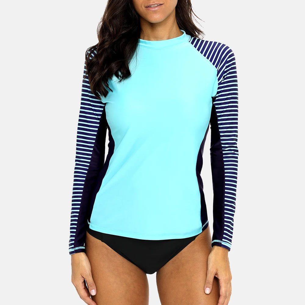 Women's long sleeved striped rashguard swimwear by The Clothing Company Sydney, featuring patchwork design and UPF50+ sun protection.