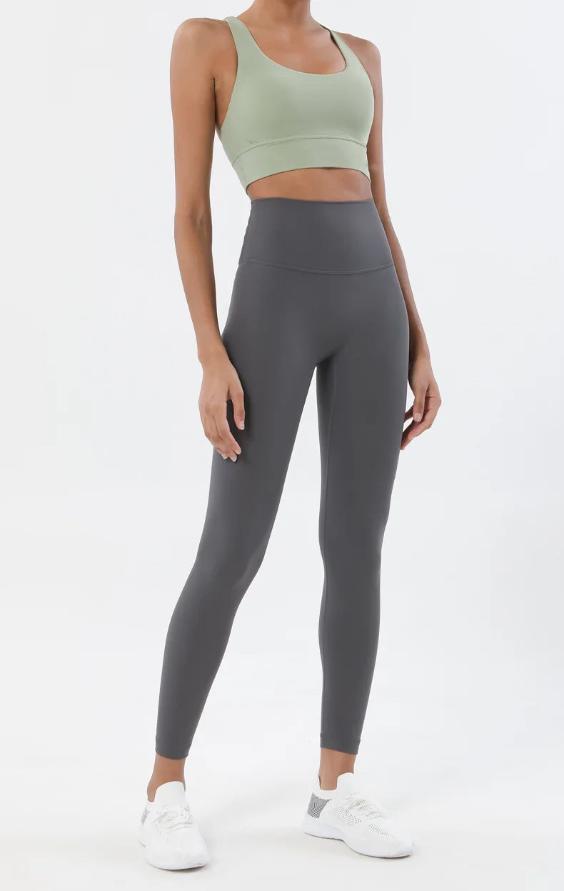 Nylon women's yoga fitness set with sports bra and leggings, breathable gym tracksuit by The Clothing Company Sydney.