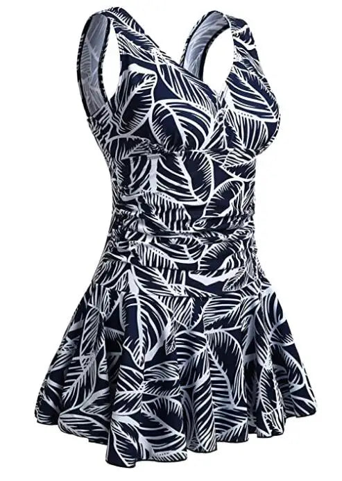 Women’s floral print modest swim dress by The Clothing Company Sydney, plus-size one-piece swimsuit with padding and full coverage.