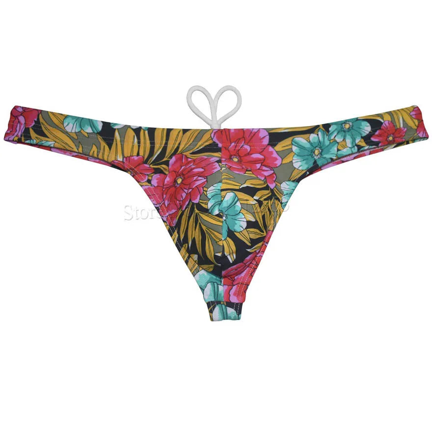 Men's bikini swim thong from The Clothing Company Sydney, printed T-back swimsuit with smooth fabric, ideal for beach and surfing.