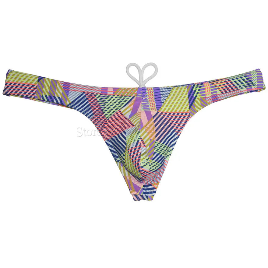 Men's bikini swim thong by The Clothing Company Sydney featuring printed T-back design and smooth swimwear fabric.