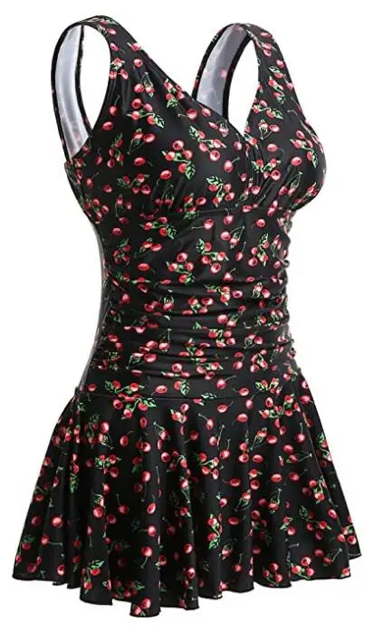 Women’s floral print modest swim dress by The Clothing Company Sydney, plus-size padded one-piece swimsuit for comfortable swimming.