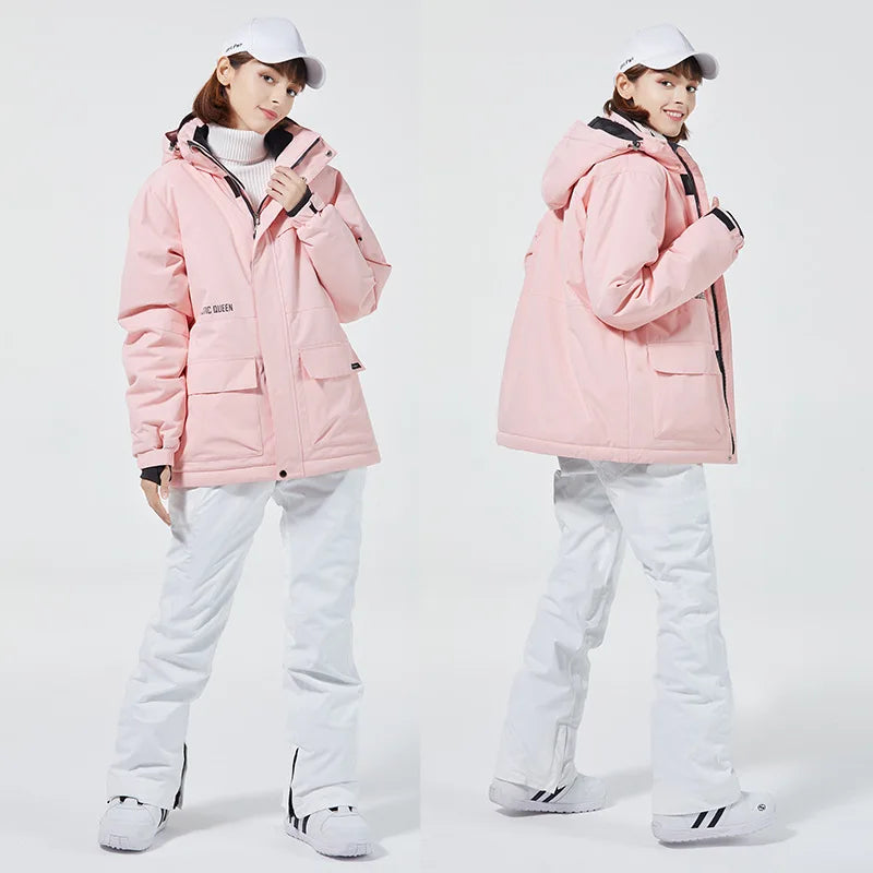 Women's 2-piece ski suit from The Clothing Company Sydney featuring waterproof, windproof snowboard jacket and snow overalls.