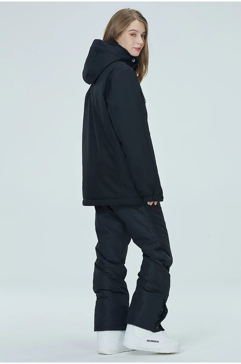 Women's 2-piece ski suit by The Clothing Company Sydney, waterproof windproof snowboard jacket and pants set for winter sports.