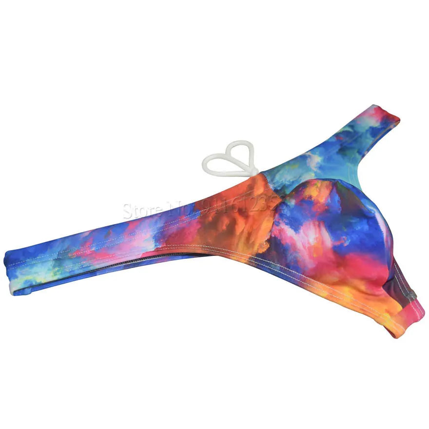 Men's bikini swim thong by The Clothing Company Sydney featuring printed, smooth T-back design for beach and surfing wear.