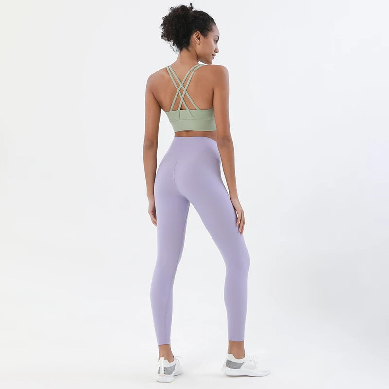 Nylon women's yoga and fitness tracksuit set with leggings and sports bra from The Clothing Company Sydney, breathable sportswear.