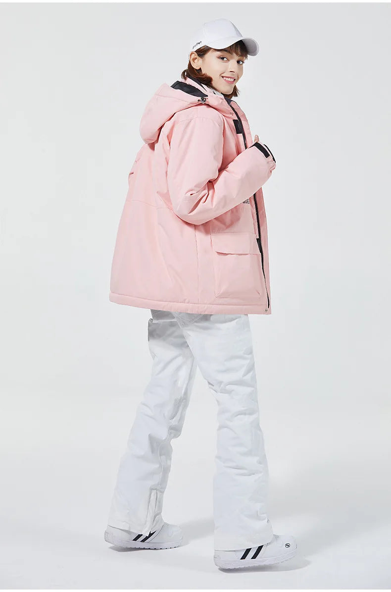 Women's waterproof ski suit with jacket and pants set by The Clothing Company Sydney, ideal for snowboarding and winter sports.