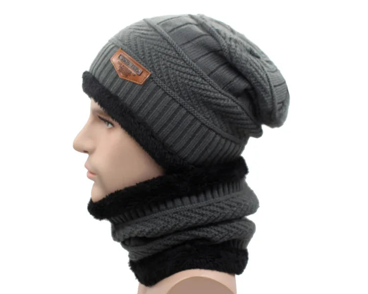 Knitted winter beanie hat with matching scarf, skull cap style, worn by a man and woman, from The Clothing Company Sydney.