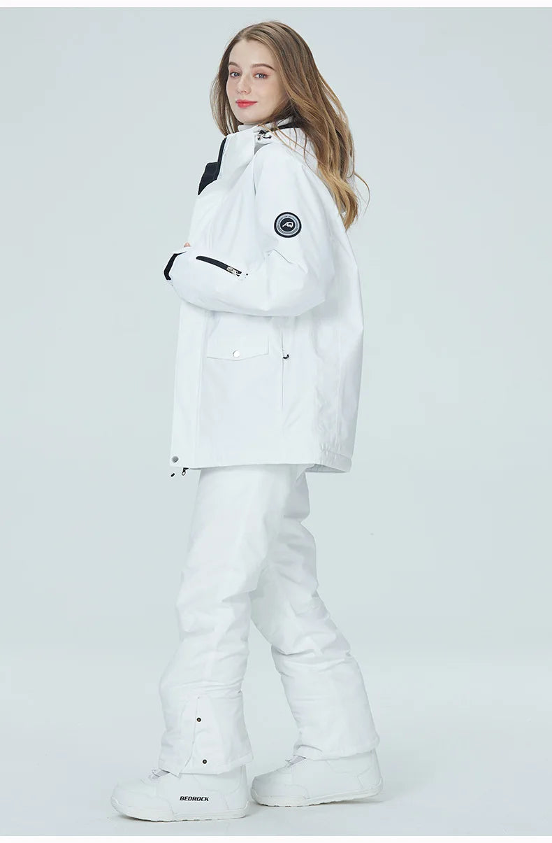 Women's waterproof and windproof ski suit set with jacket and snow overalls, ideal for snowboarding and winter skiing.