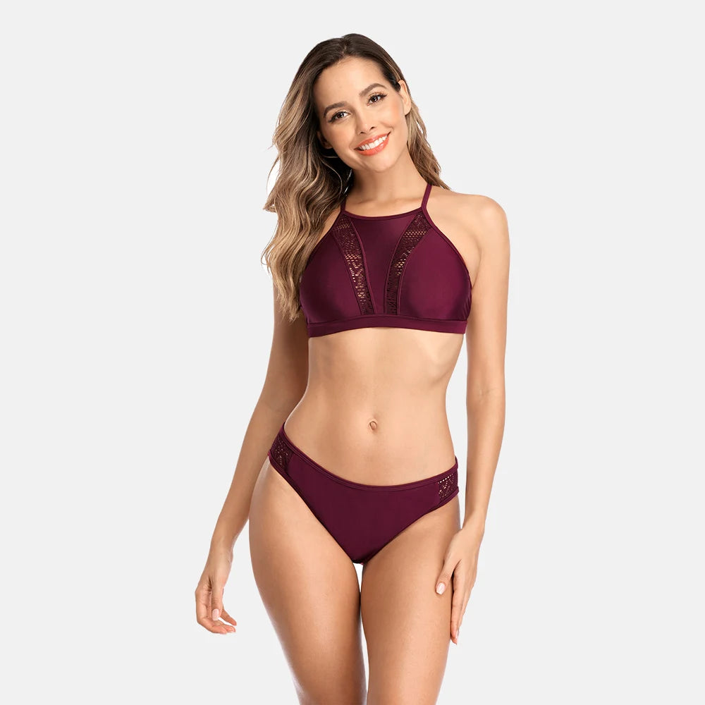Women's high neck bikini swimsuit by The Clothing Company Sydney featuring hollow out design and bandage style for beachwear.