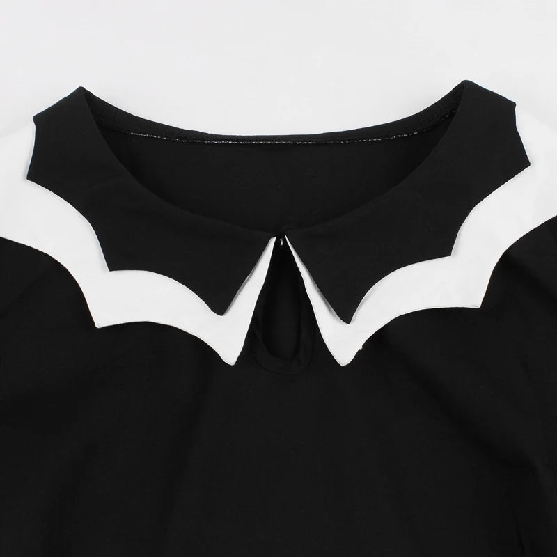 Vintage bat embroidery Halloween costume dress by The Clothing Company Sydney, featuring cap sleeves, keyhole front, and retro A-line style.