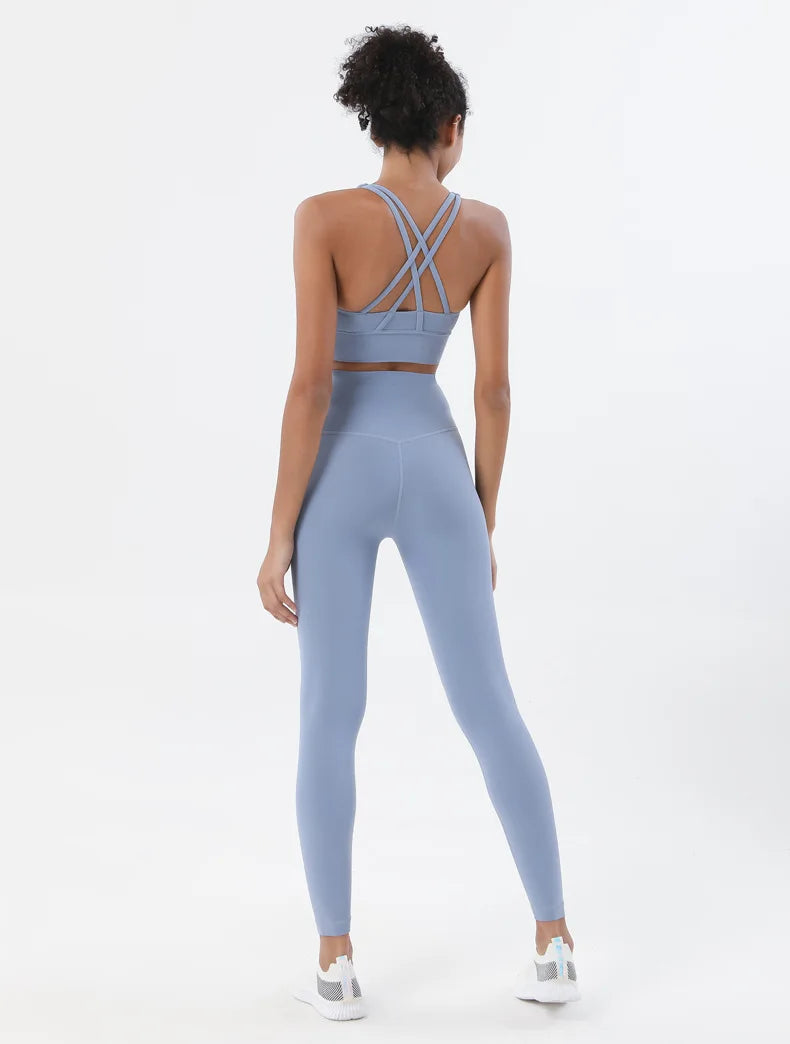 Nylon women's yoga and fitness tracksuit by The Clothing Company Sydney, featuring breathable sports bra and matching leggings.