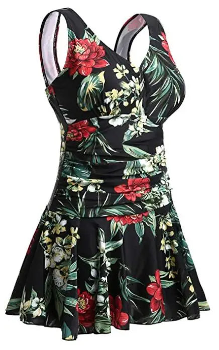 Women’s floral print modest swim dress by The Clothing Company Sydney, plus-size padded one-piece swimsuit with full coverage.