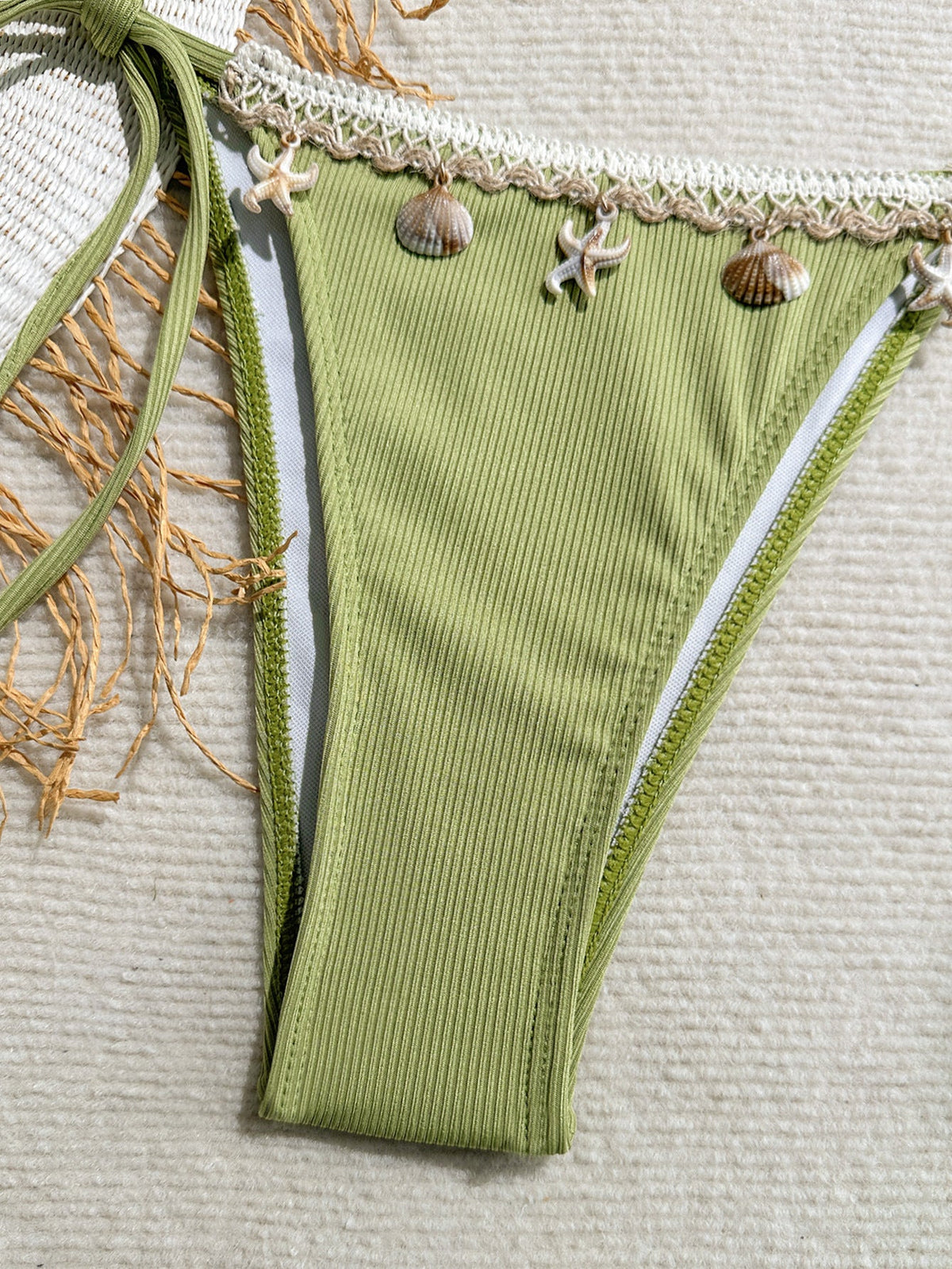 Ribbed shell decoration two-piece bikini set for women featuring halter straps, from The Clothing Company Sydney, on a model.