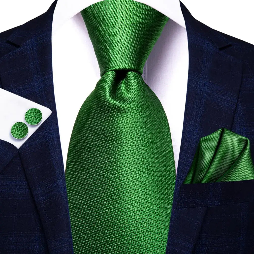 Green paisley silk tie set for men including necktie, pocket square, and cufflinks by The Clothing Company Sydney