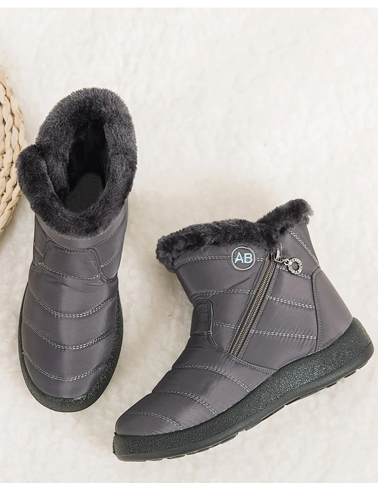 Women's winter snow boots with warm fur lining and ankle height, stylish footwear by The Clothing Company Sydney.