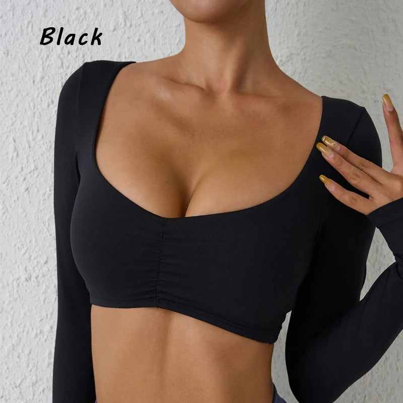 Nylon gym yoga long sleeve T-shirt with pleats, fitted sports top for women, designed for fitness and comfortable movement.
