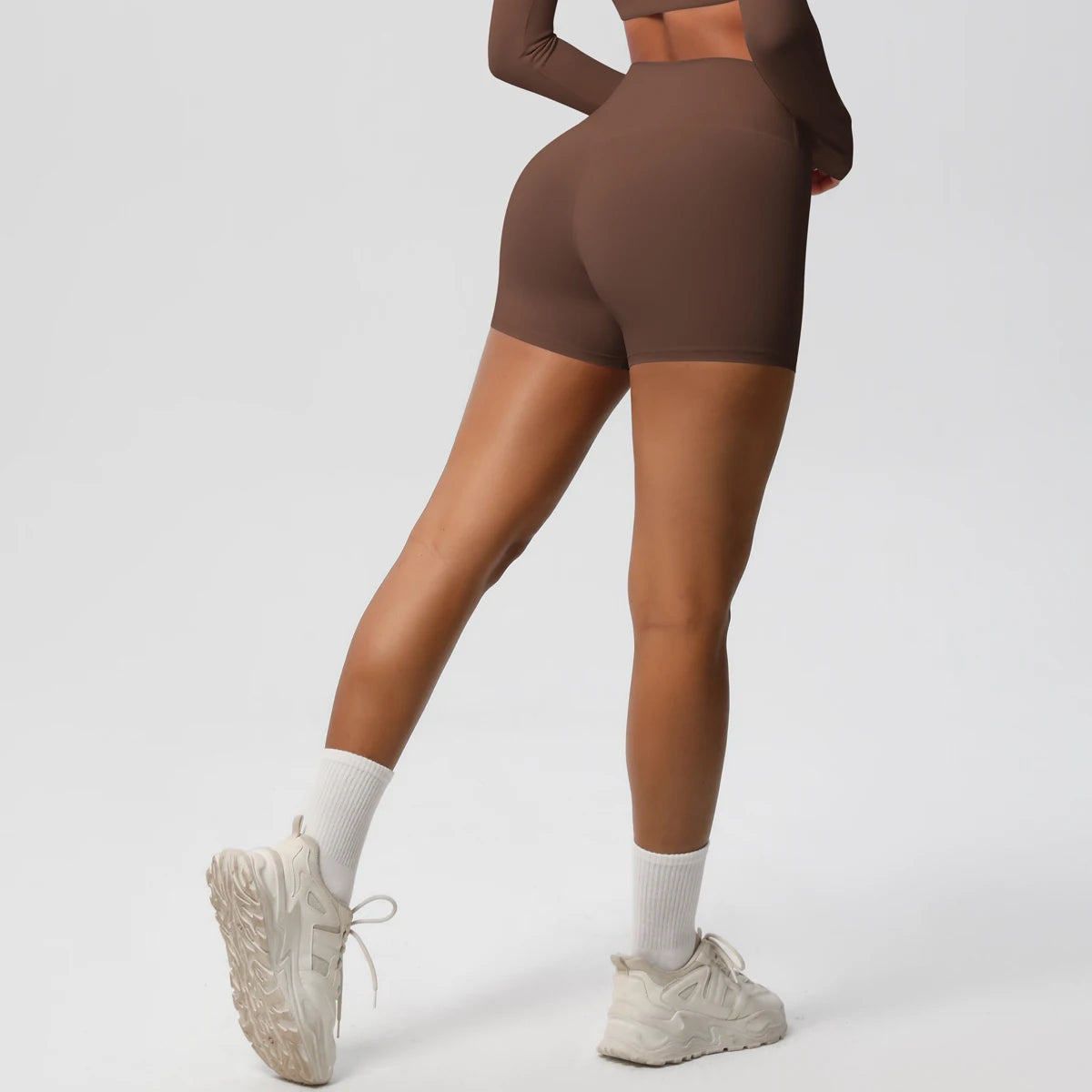 Women’s high-waist yoga and fitness shorts by The Clothing Company Sydney, featuring a push-up design and athletic fit.