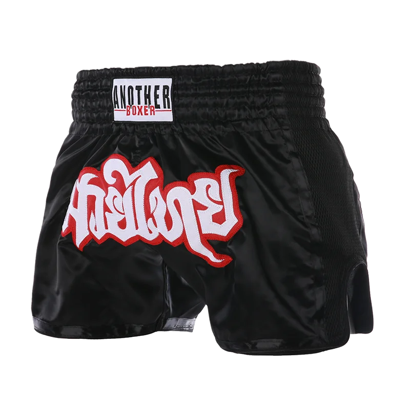 Embroidered Muay Thai boxing shorts by The Clothing Company Sydney with detailed stitching and vibrant design.