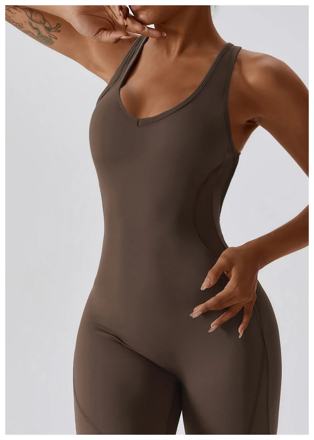 Open back V jumpsuit gym set for women, featuring stretch fabric, fitness bodysuit, and yoga-friendly sportswear by The Clothing Company Sydney.