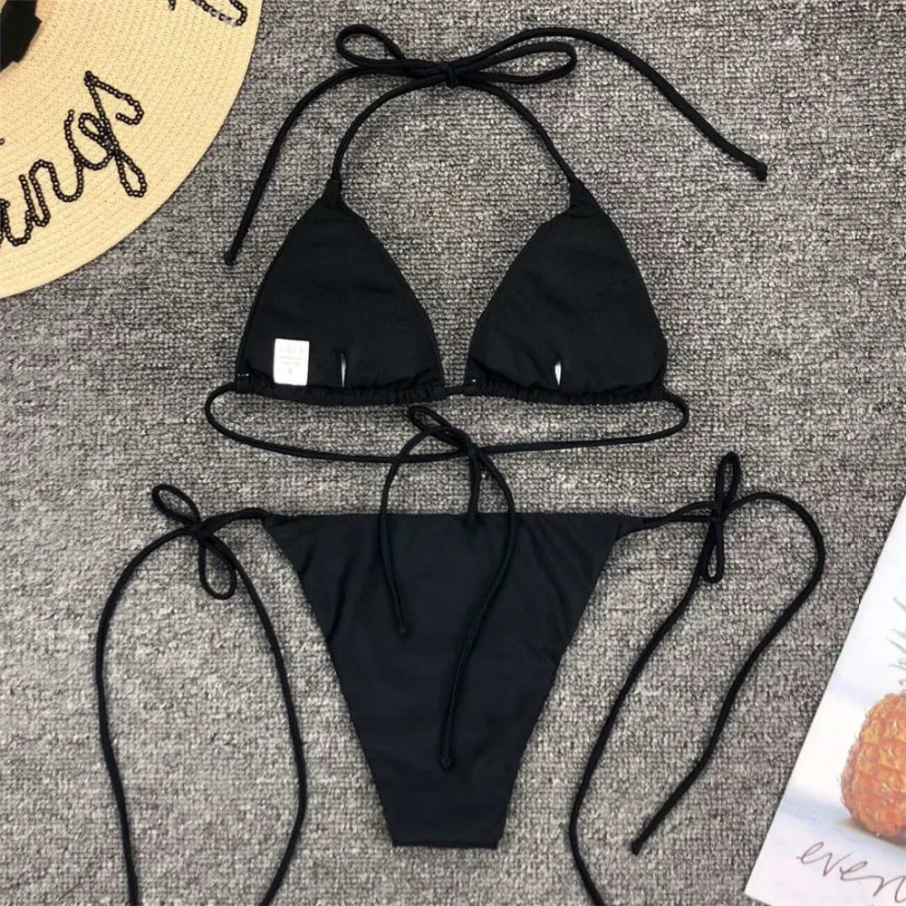 Neon pink Brazilian bikini set for women, halter two-piece swimsuit by The Clothing Company Sydney, featuring a stylish swimwear design.