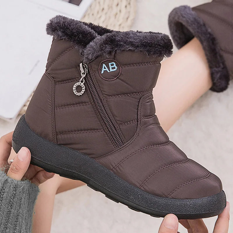 Women’s winter snow boots with warm fur lining, ankle footwear designed for cold weather by The Clothing Company Sydney.