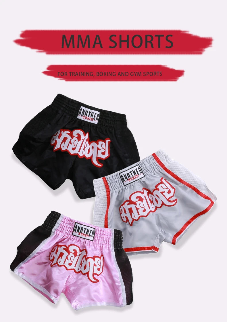 Embroidered Muay Thai boxing shorts by The Clothing Company Sydney with colorful embroidered patterns on lightweight fabric.