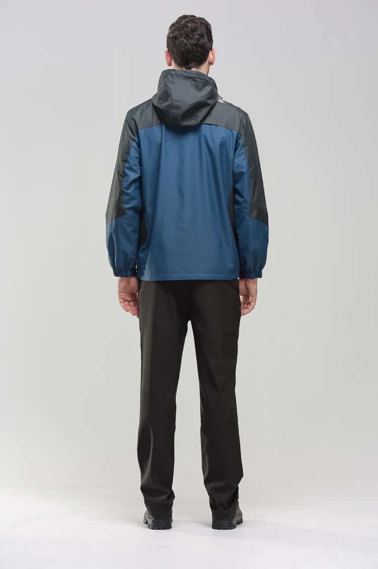 Men's outdoor camping and hiking jacket by The Clothing Company Sydney, shown in a rugged outdoor setting.