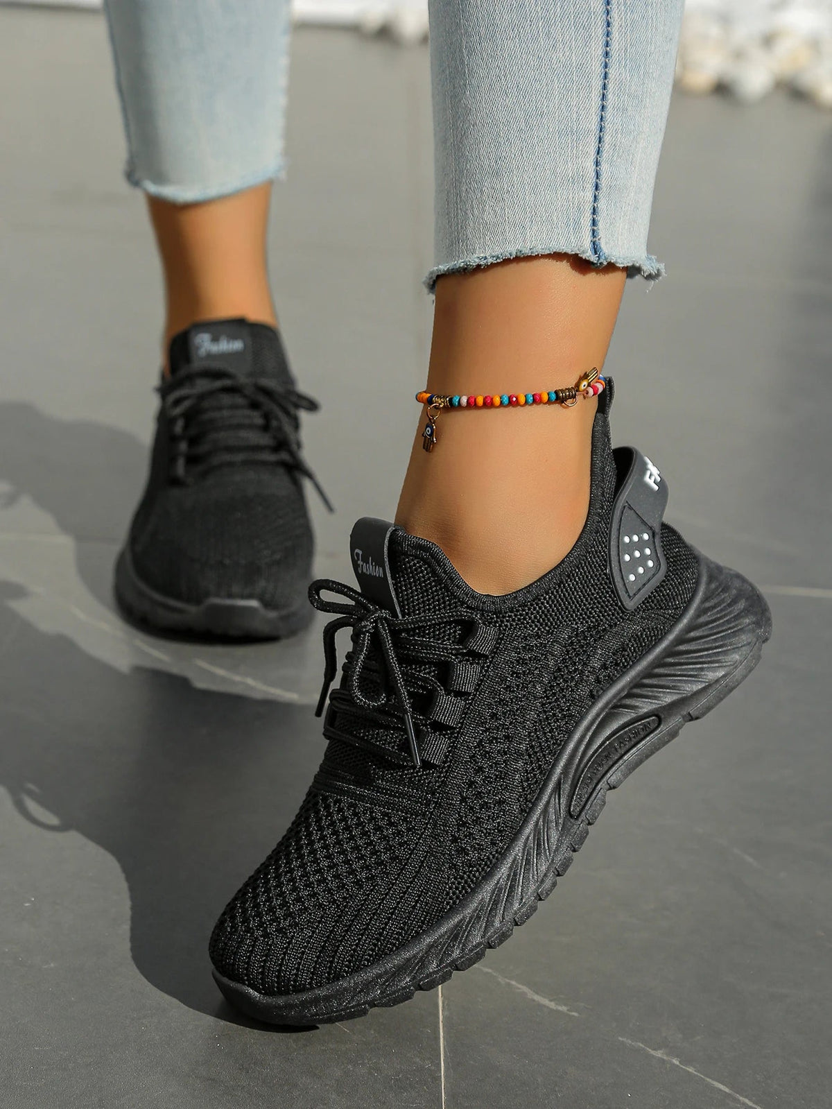 Women's fall casual sneakers by The Clothing Company Sydney featuring fly weave design and lace-up closure.