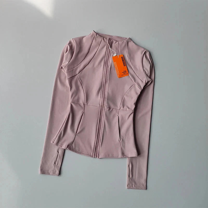Women’s slim fit zip-up fitness jacket by The Clothing Company Sydney, long sleeve activewear top for yoga, running, and gym workouts.
