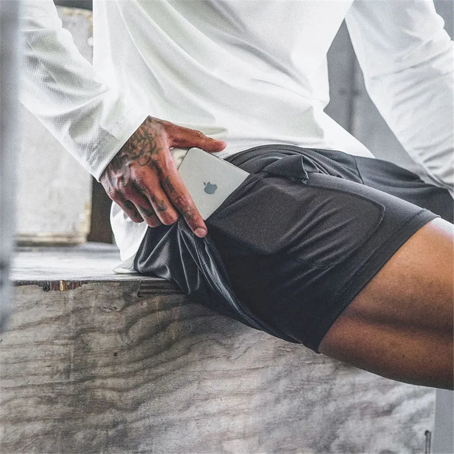 Men’s 2-in-1 running shorts from The Clothing Company Sydney featuring double-layer design for gym training and beach sports.