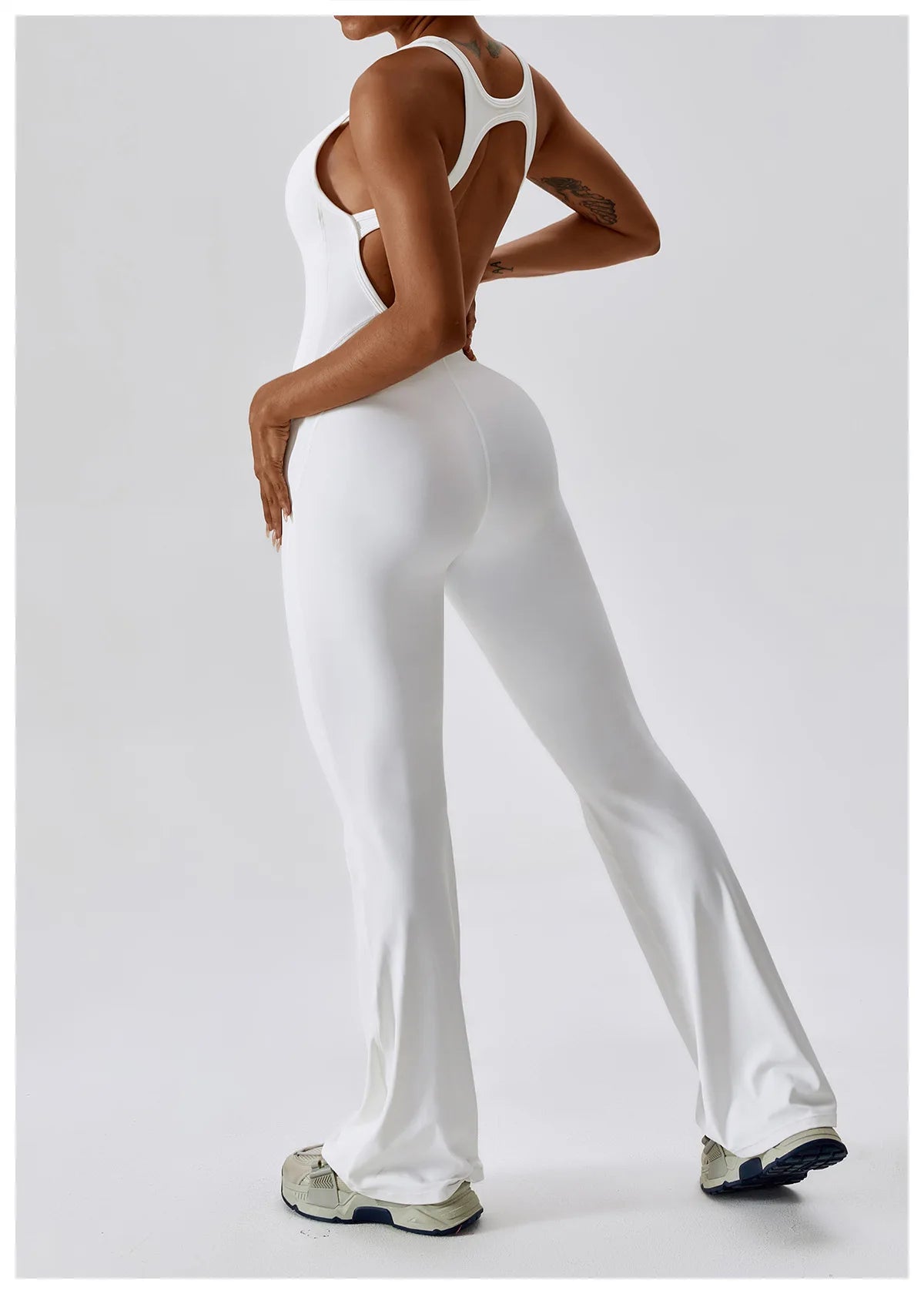 Open back V jumpsuit gym set for women, featuring stretch fabric, suitable for yoga, training, and fitness workouts by The Clothing Company Sydney.