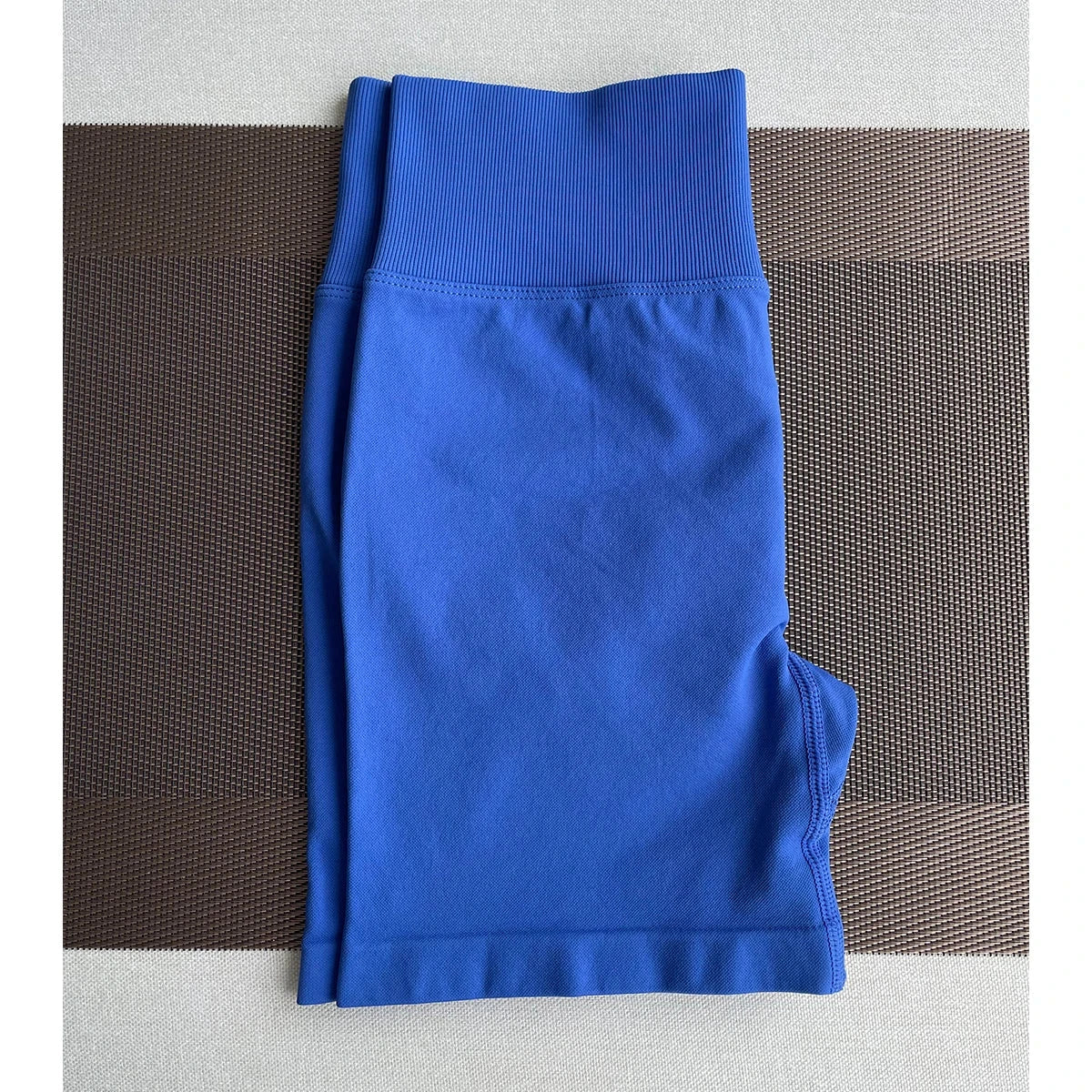 Women’s solid seamless half pants by The Clothing Company Sydney, soft fitness shorts for yoga, gym, running, and cycling activities.