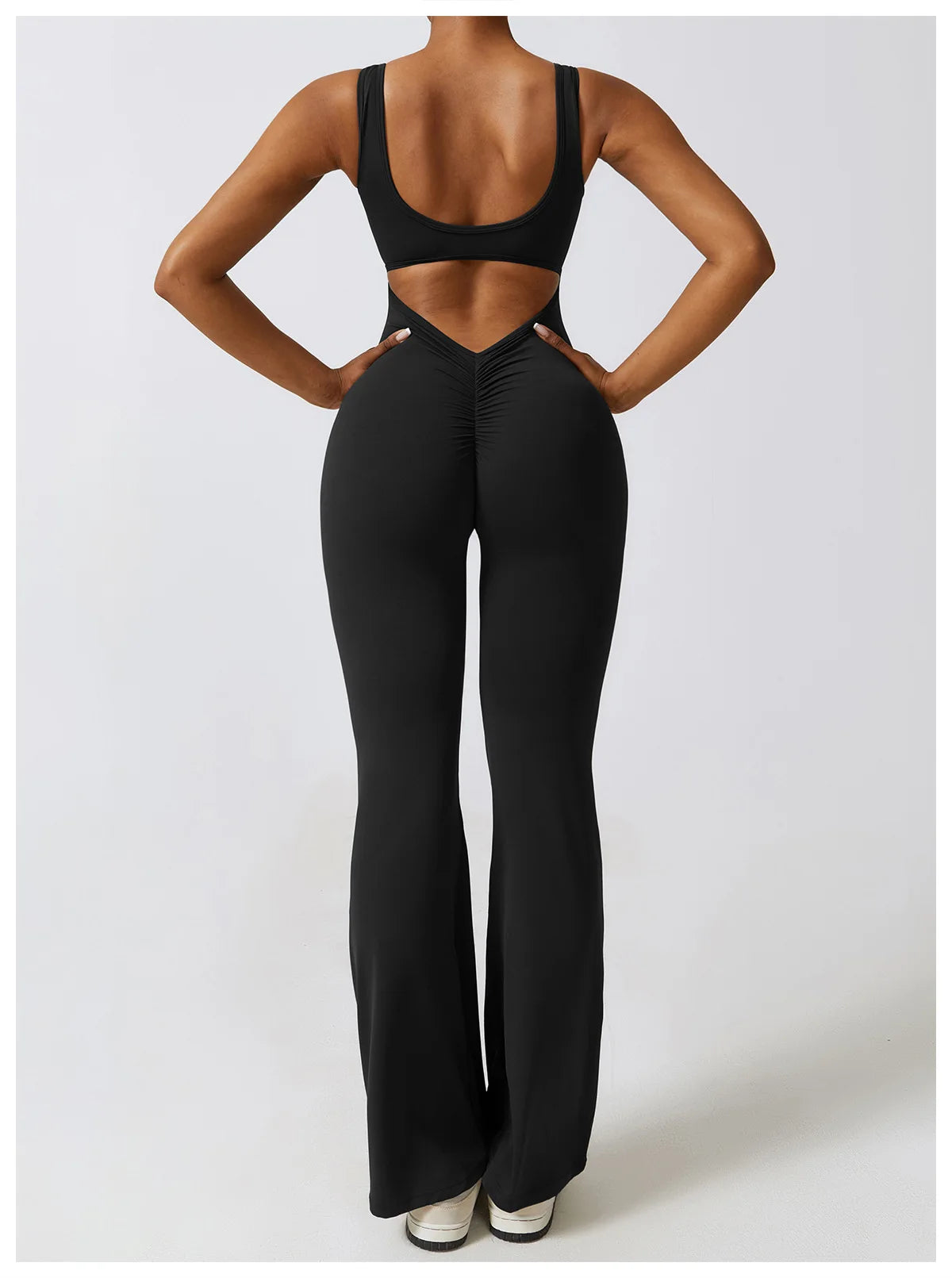 Open back V jumpsuit gym set by The Clothing Company Sydney, women’s fitness sportswear for yoga, training, and workout activities.