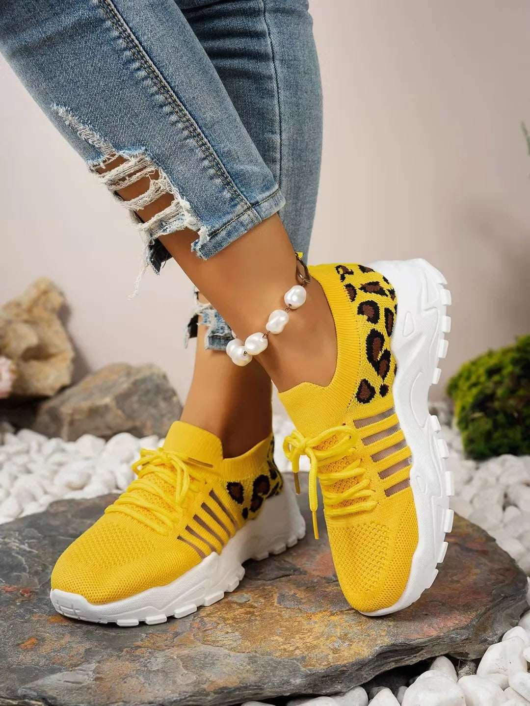 Leopard print women's sneakers by The Clothing Company Sydney featuring waterproof design and stylish casual footwear.
