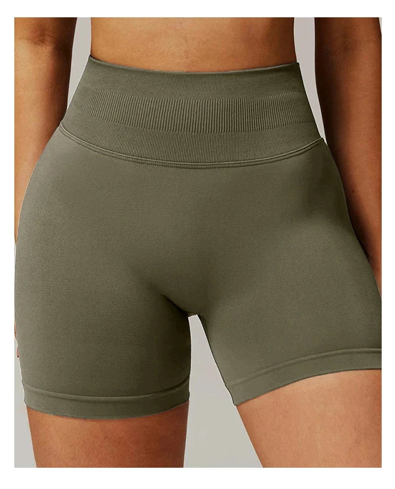 Solid seamless half pants for women, soft fitness shorts by The Clothing Company Sydney, ideal for yoga, gym, running, and biking.