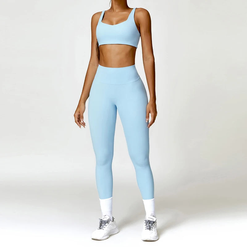Two-piece women's fitness tracksuit by The Clothing Company Sydney, includes sports leggings and matching workout jacket for gym and running.