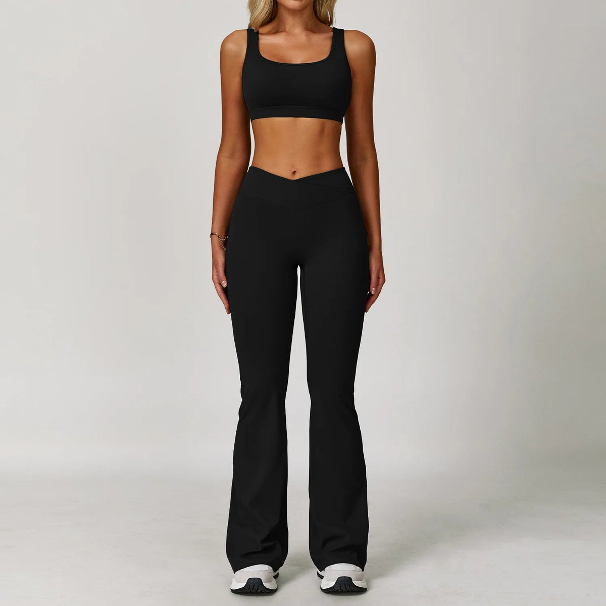Women's fitness yoga and gym workout set by The Clothing Company Sydney, includes sports bra, leggings, and matching gym tracksuits.