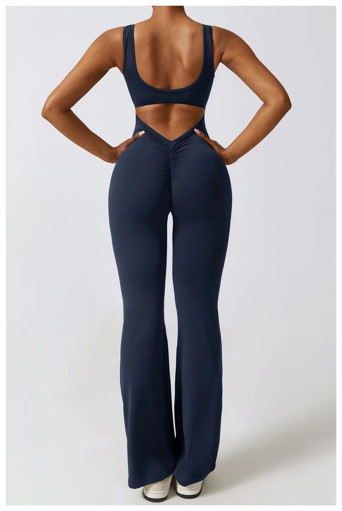 Open back V jumpsuit gym set for women by The Clothing Company Sydney, stretch fitness romper suitable for yoga and workout activities.