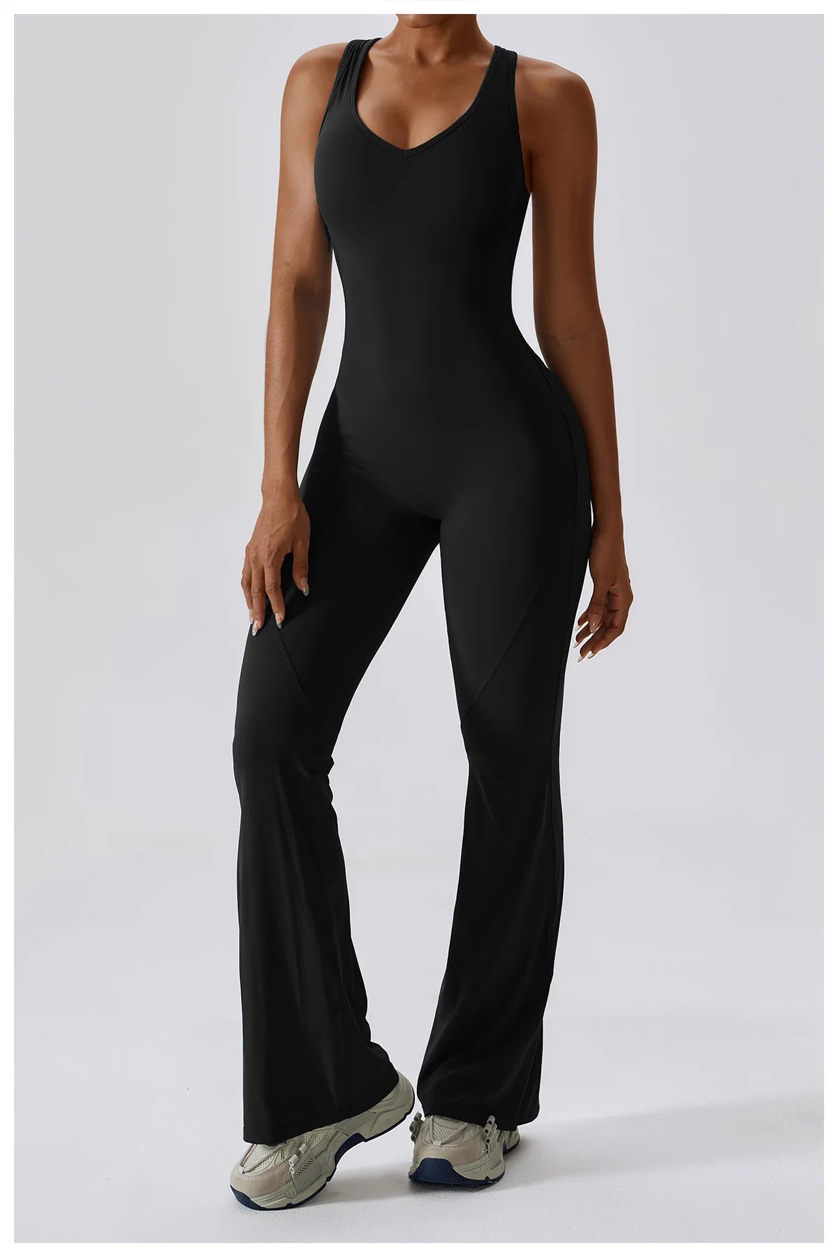 Open back V jumpsuit gym set by The Clothing Company Sydney, women's stretchy fitness romper for yoga and workout training.