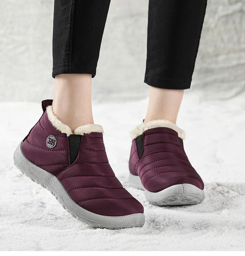 Men's winter ankle boots by The Clothing Company Sydney, slip-on waterproof snow shoes with fur lining and rugged soles.
