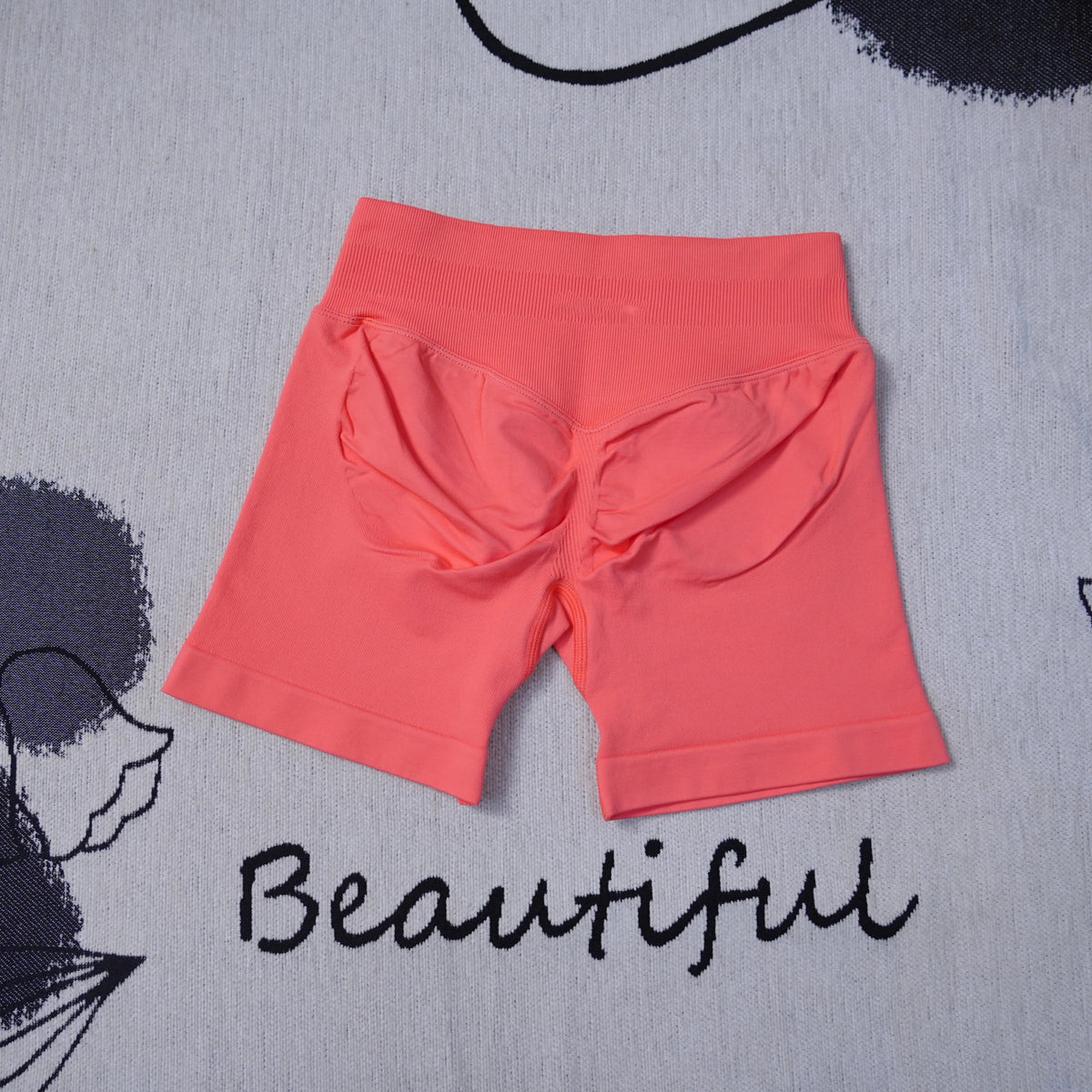 Women's high-waisted seamless yoga shorts by The Clothing Company Sydney, breathable gym and running fitness shorts with butt-lifting design.