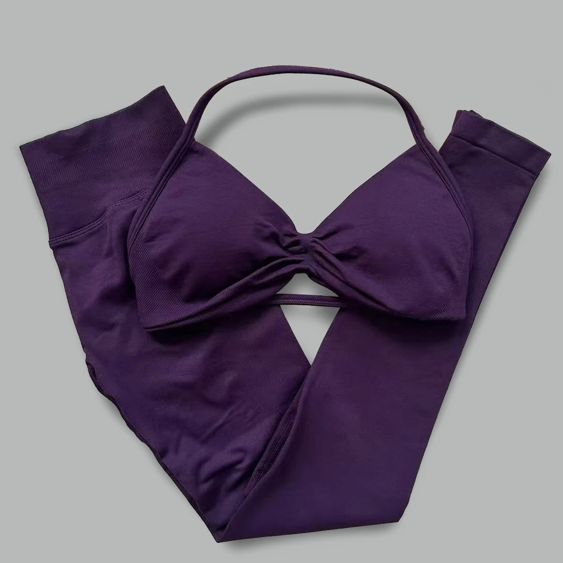 Women's seamless yoga set with halter neck sports bra and high-waisted lifting leggings by The Clothing Company Sydney